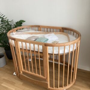 Овальная детская кроватка-трансформер Smart Bed 9-в-1 с подвижной стенкой