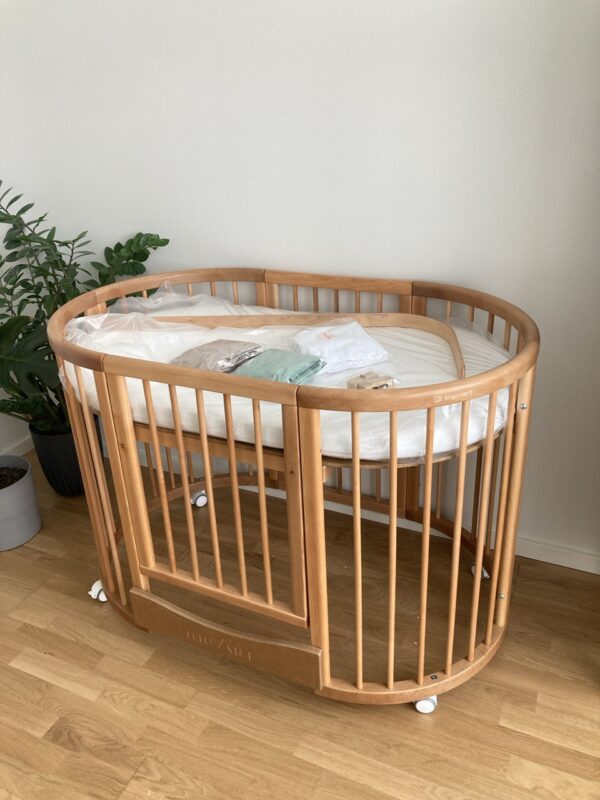 Овальная детская кроватка-трансформер Smart Bed 9-в-1 с подвижной стенкой